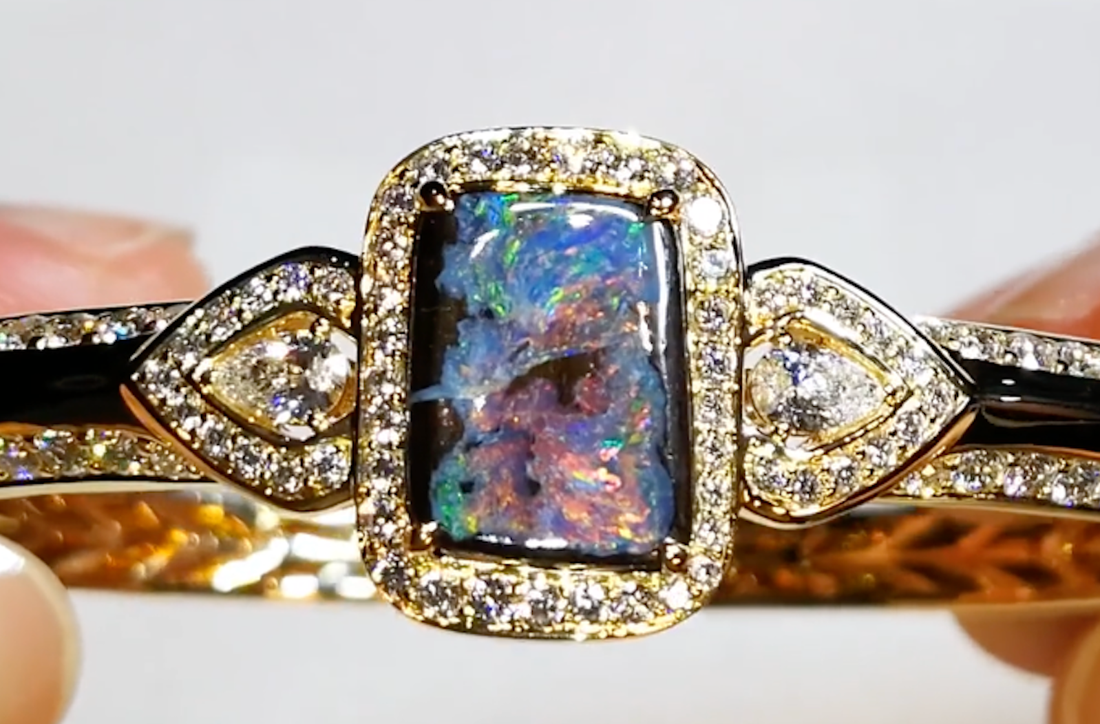 4.36ct Lightning Ridge Black Boulder Opal Bangle with D Flawless Diamonds set in 18K Yellow Gold