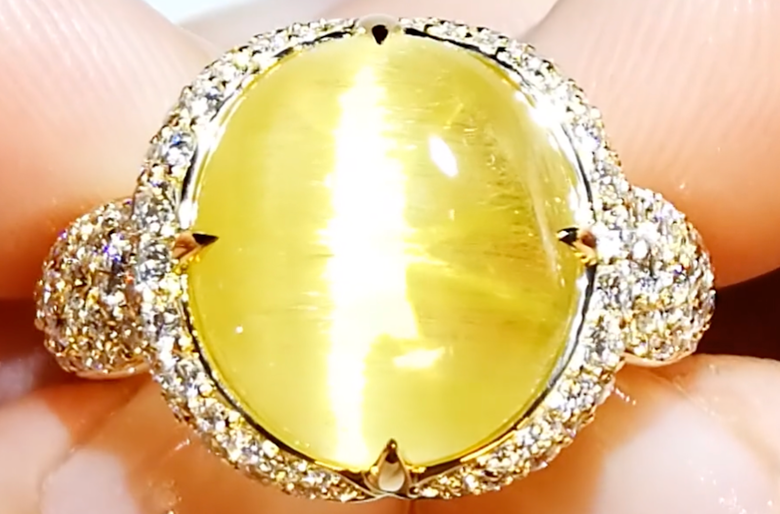8.21ct Neon Cats Eye Danburite Ring with D Flawless Diamonds set in 18K Yellow Gold