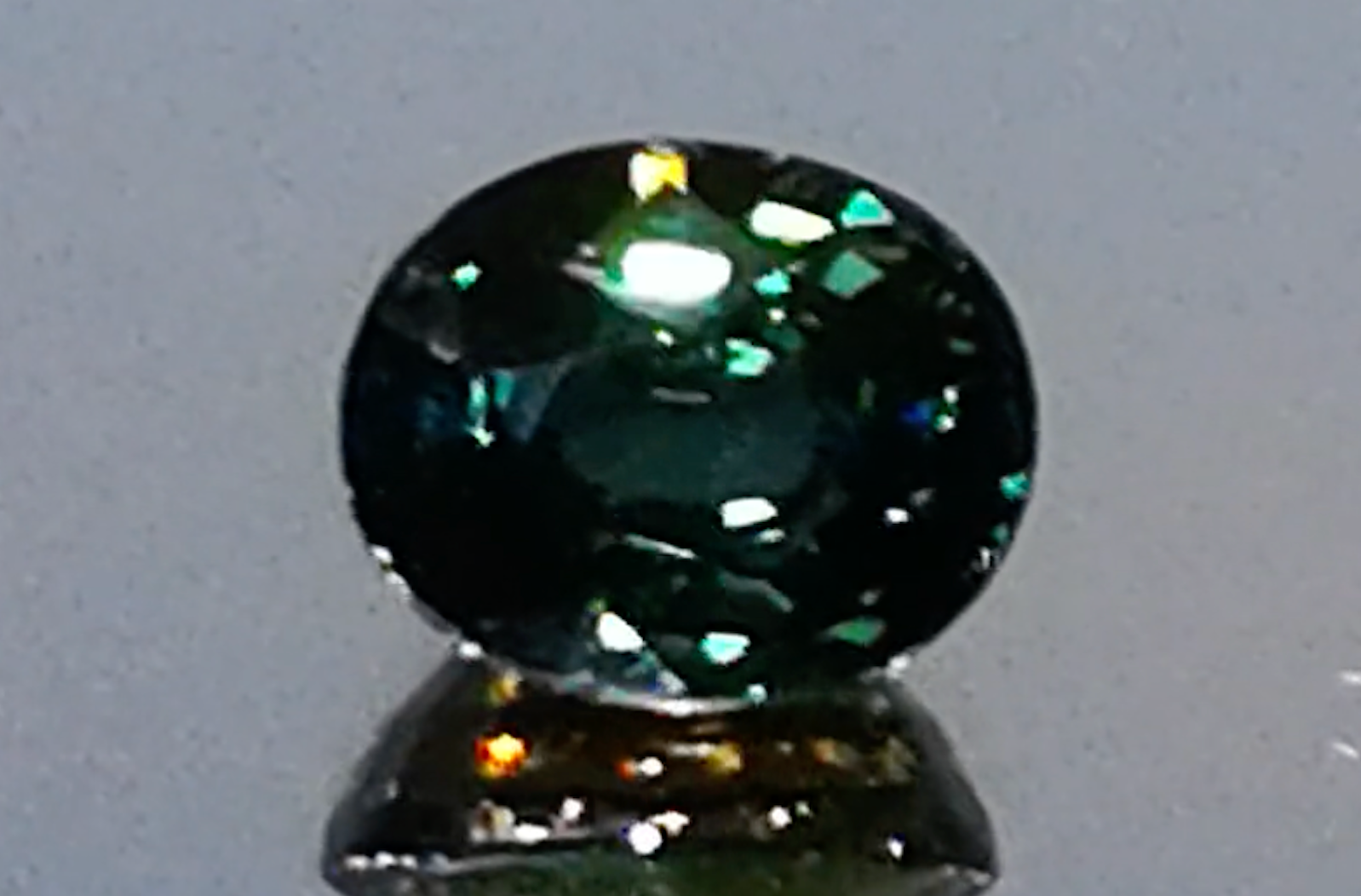 3.06ct Unheated Green Tanzanite Ring with D Flawless Diamonds set in 18K Yellow Gold