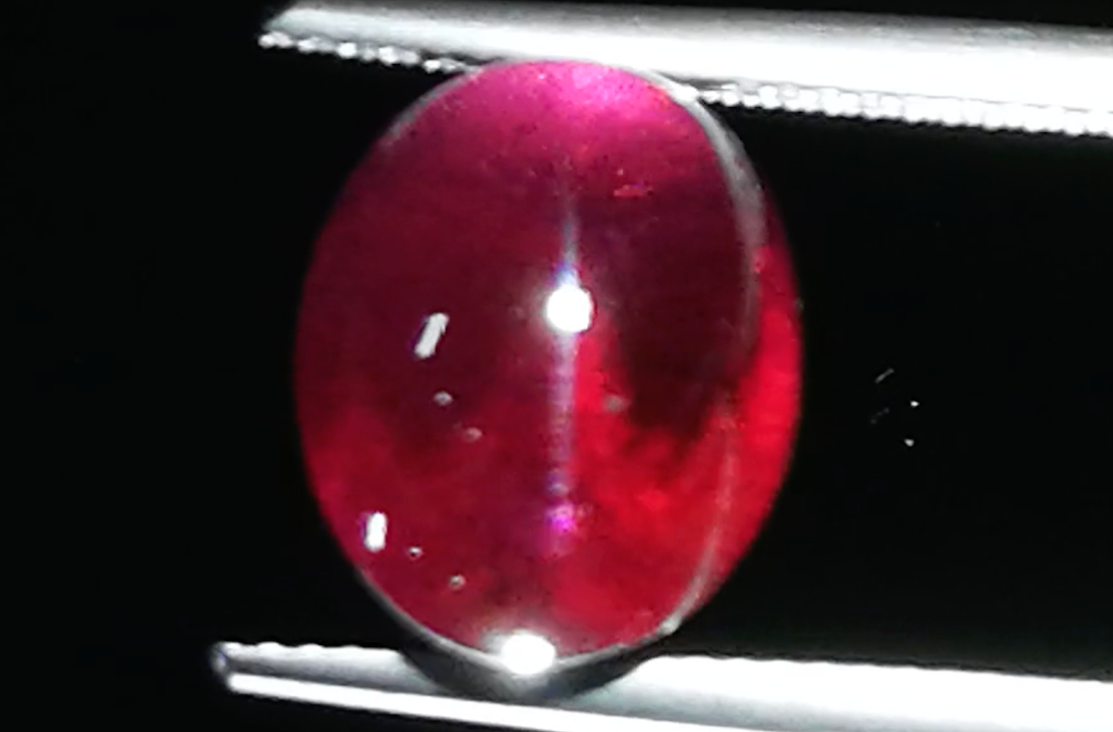 11.87ct Cats Eye Magenta Garnet Ring with D Flawless Diamonds set in 18K Yellow Gold