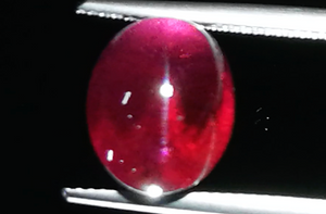 11.87ct Cats Eye Magenta Garnet Ring with D Flawless Diamonds set in 18K Yellow Gold