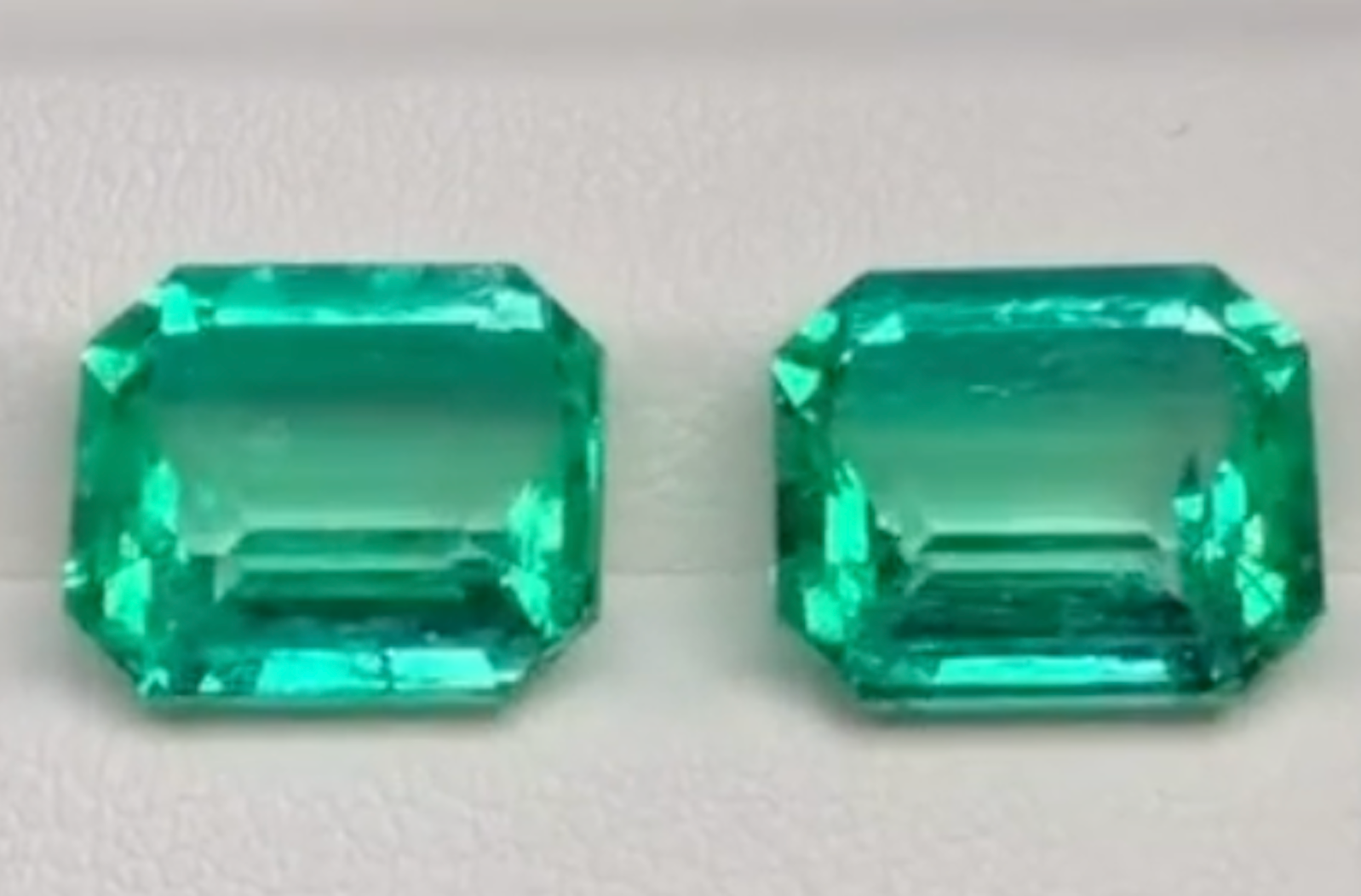 10.58ct Intense Green Muzo Colombian Emerald Earrings with D Flawless Diamonds set in 18K Yellow Gold
