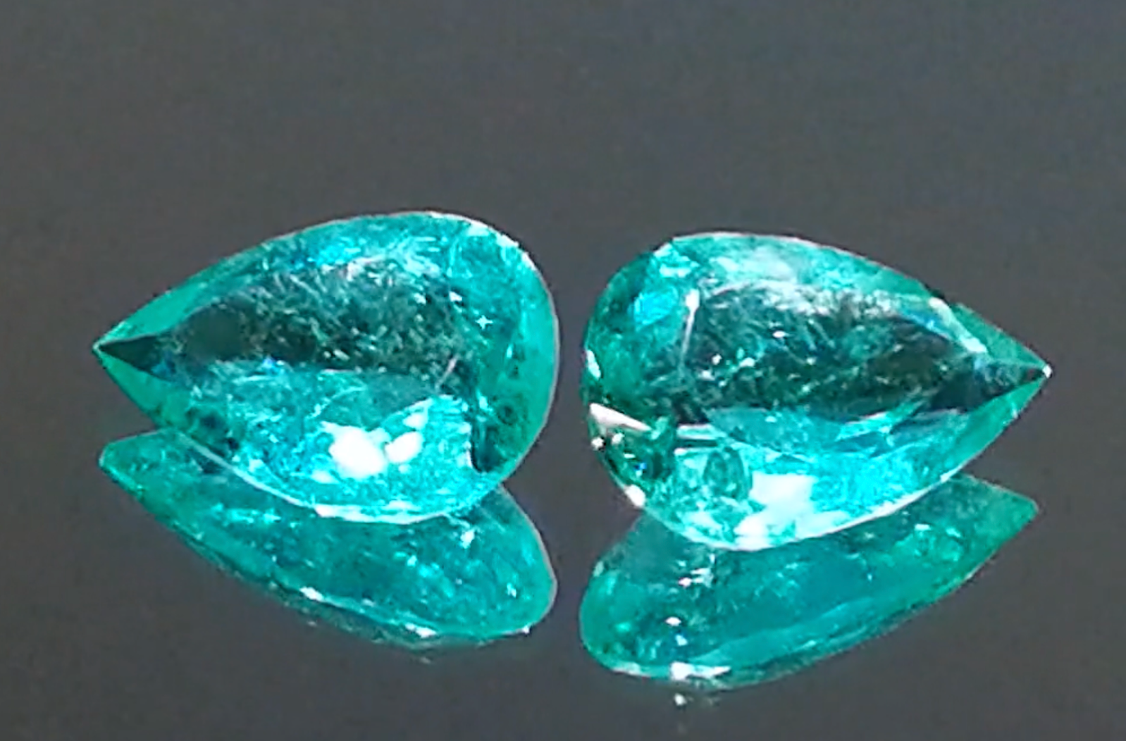 6.51ct Intense Green Muzo Colombian Emerald Earrings with D Flawless Diamonds set in 18K Yellow Gold