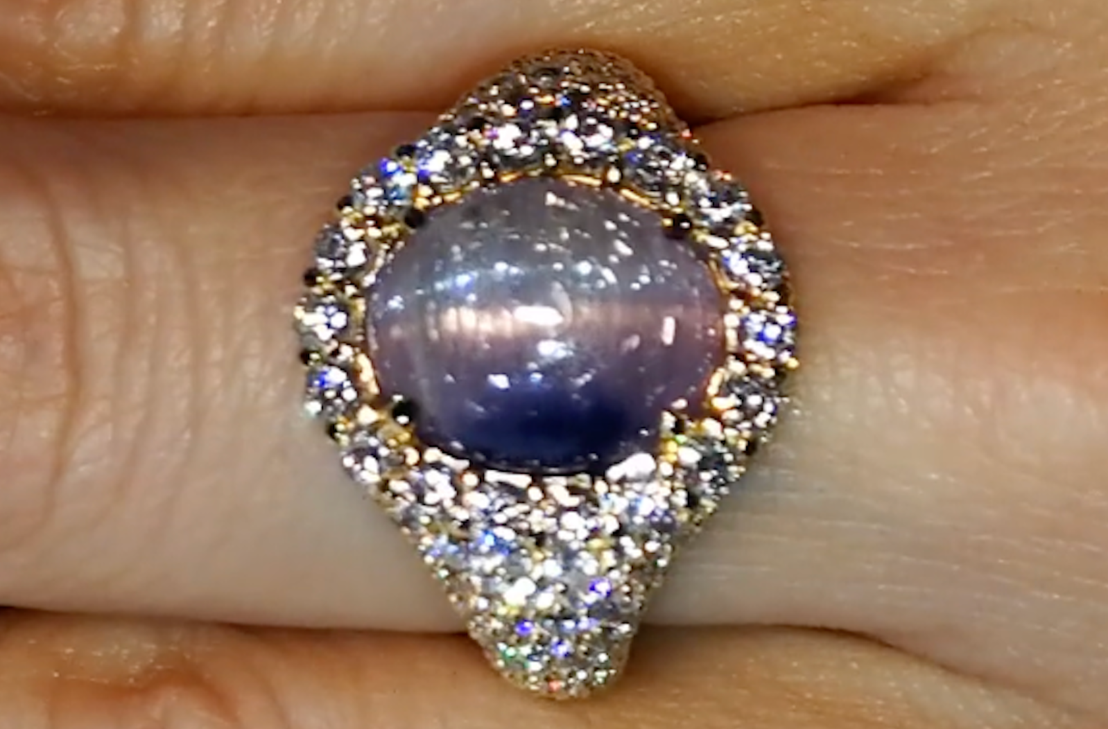 7.22ct Unheated Cat's Eye Bi Colour Tanzanite Ring with D Flawless Diamonds set in 18K Yellow Gold