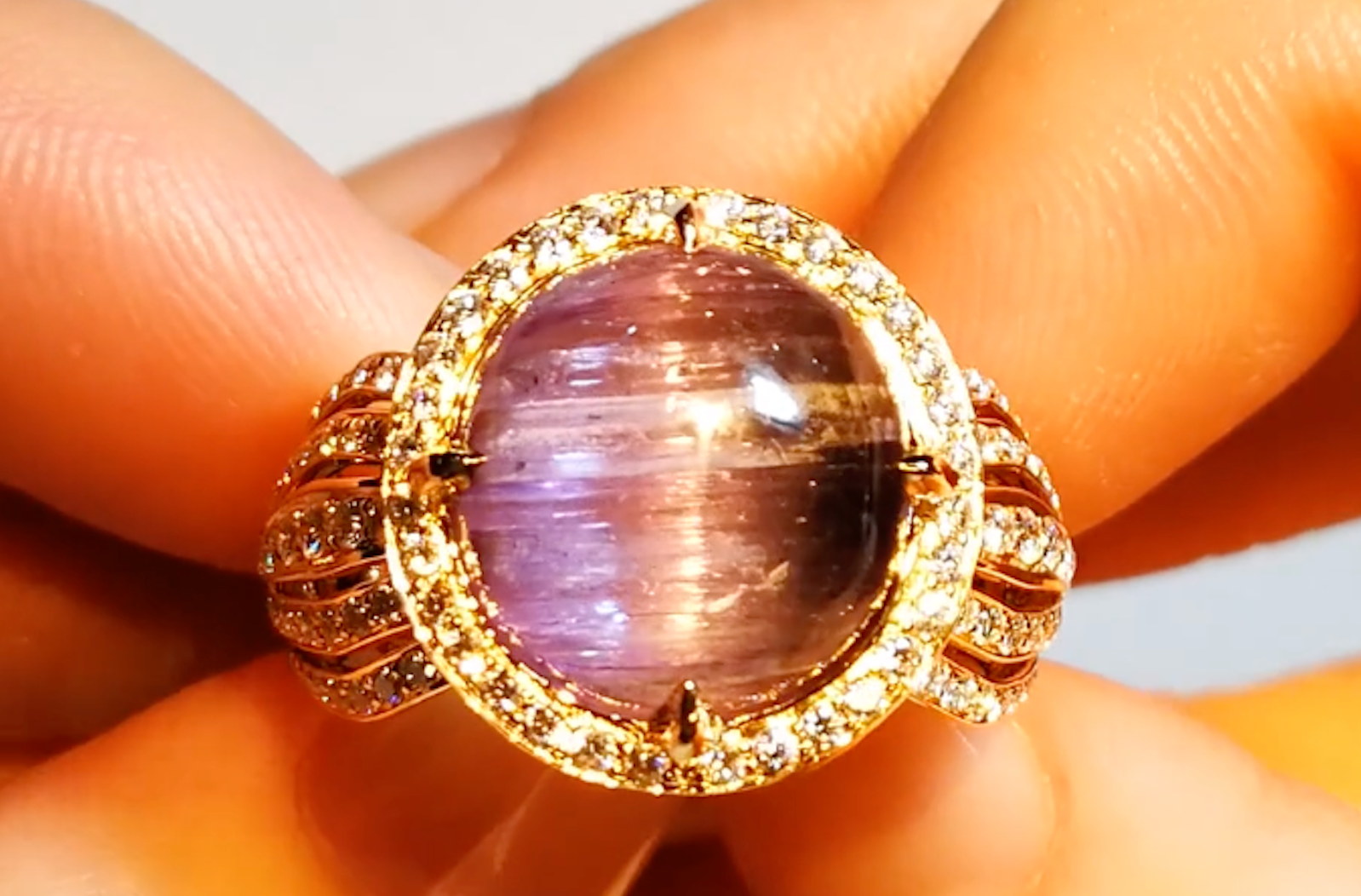 12.16ct Unheated Pink Cat's Eye Tanzanite Ring with D Flawless Diamonds set in 18K Yellow Gold