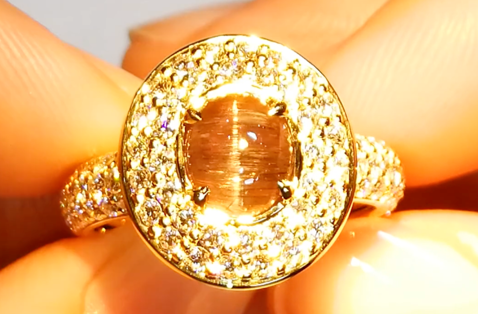 3.31ct Unheated Pinkish Tanzanite Cat’s Eye Ring with D Flawless Diamonds set in 18K Yellow Gold