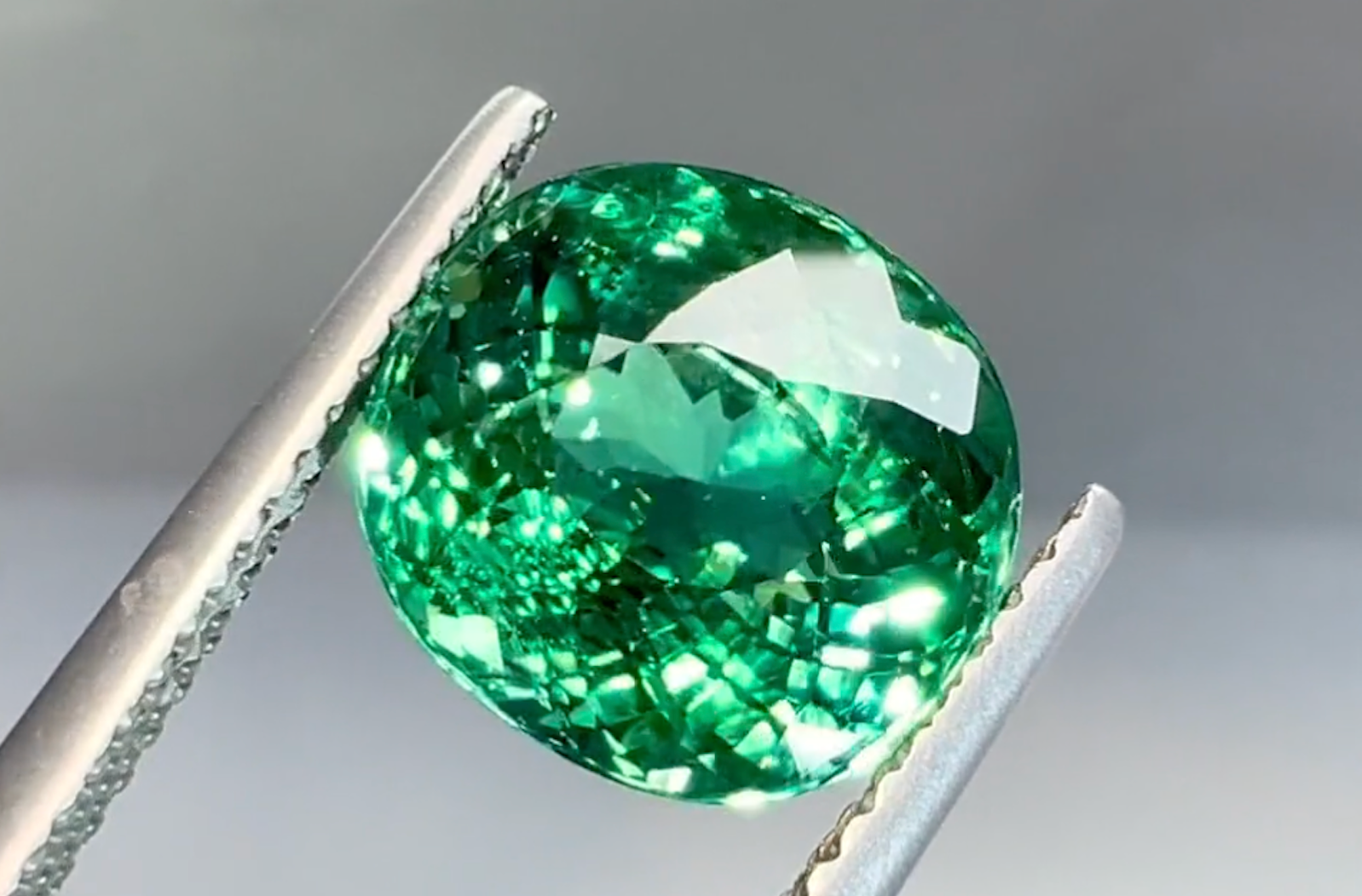 5.12ct Neon Paraiba Tourmaline Ring with D Flawless Diamonds set in 18K White Gold