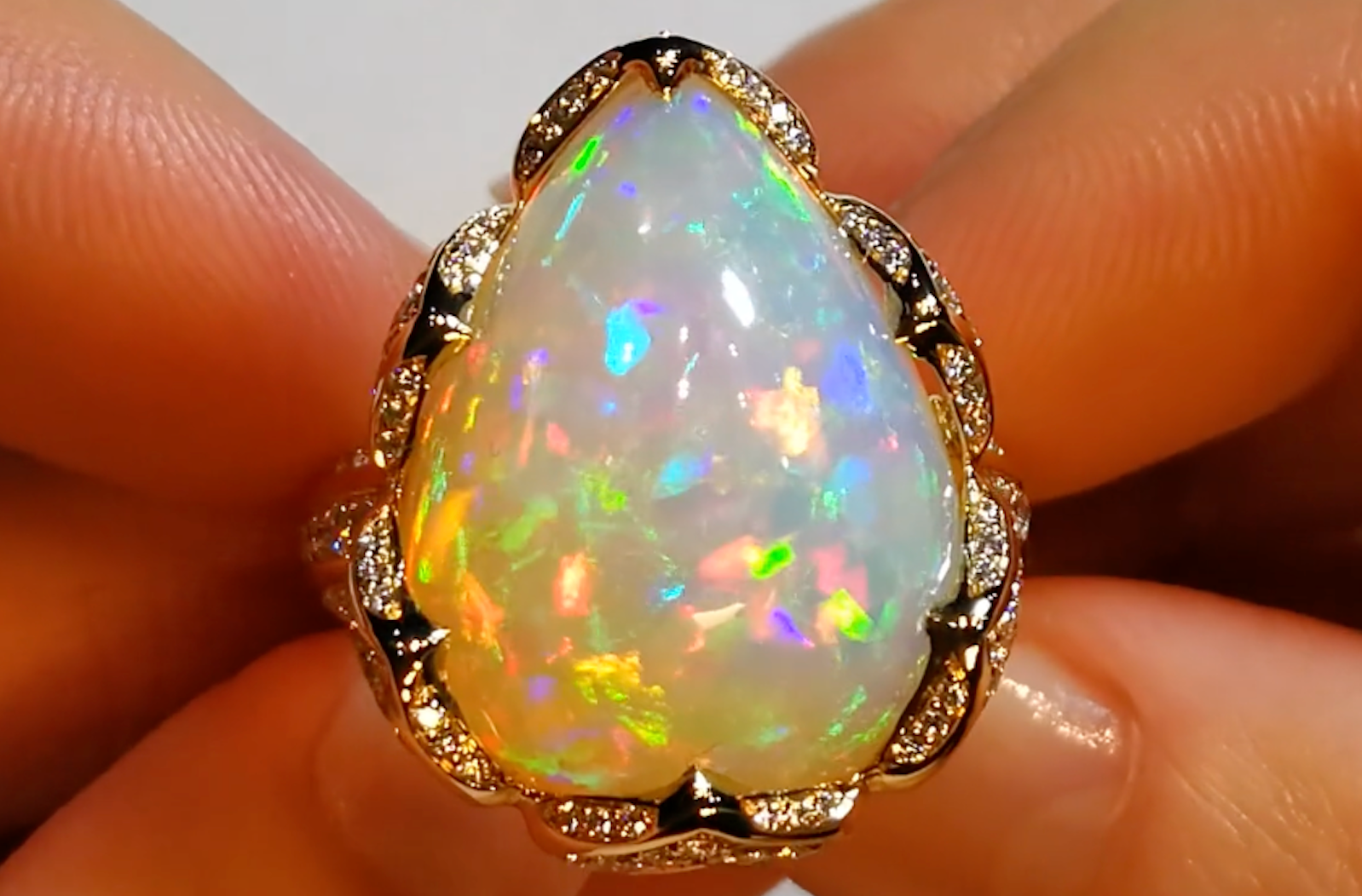 16.07ct Opal Ring with D Flawless Diamonds set in 18K Yellow Gold