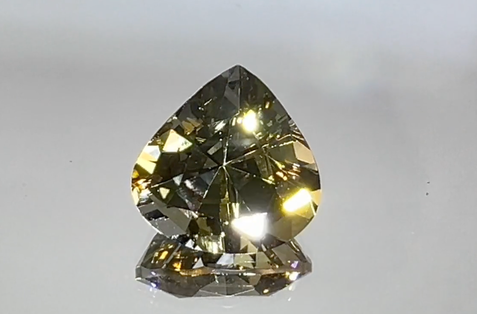 11.04ct Unheated Yellow Tanzanite Ring with D Flawless Diamonds set in 18K White Gold