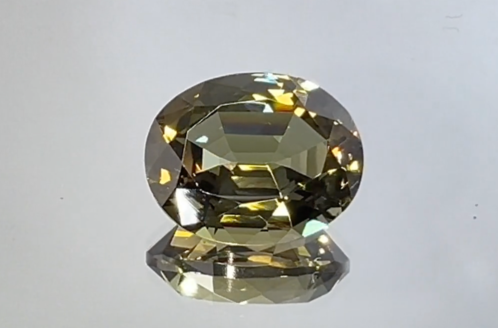 10.72ct Unheated Yellow Tanzanite Ring with D Flawless Diamonds set in 18K Yellow Gold