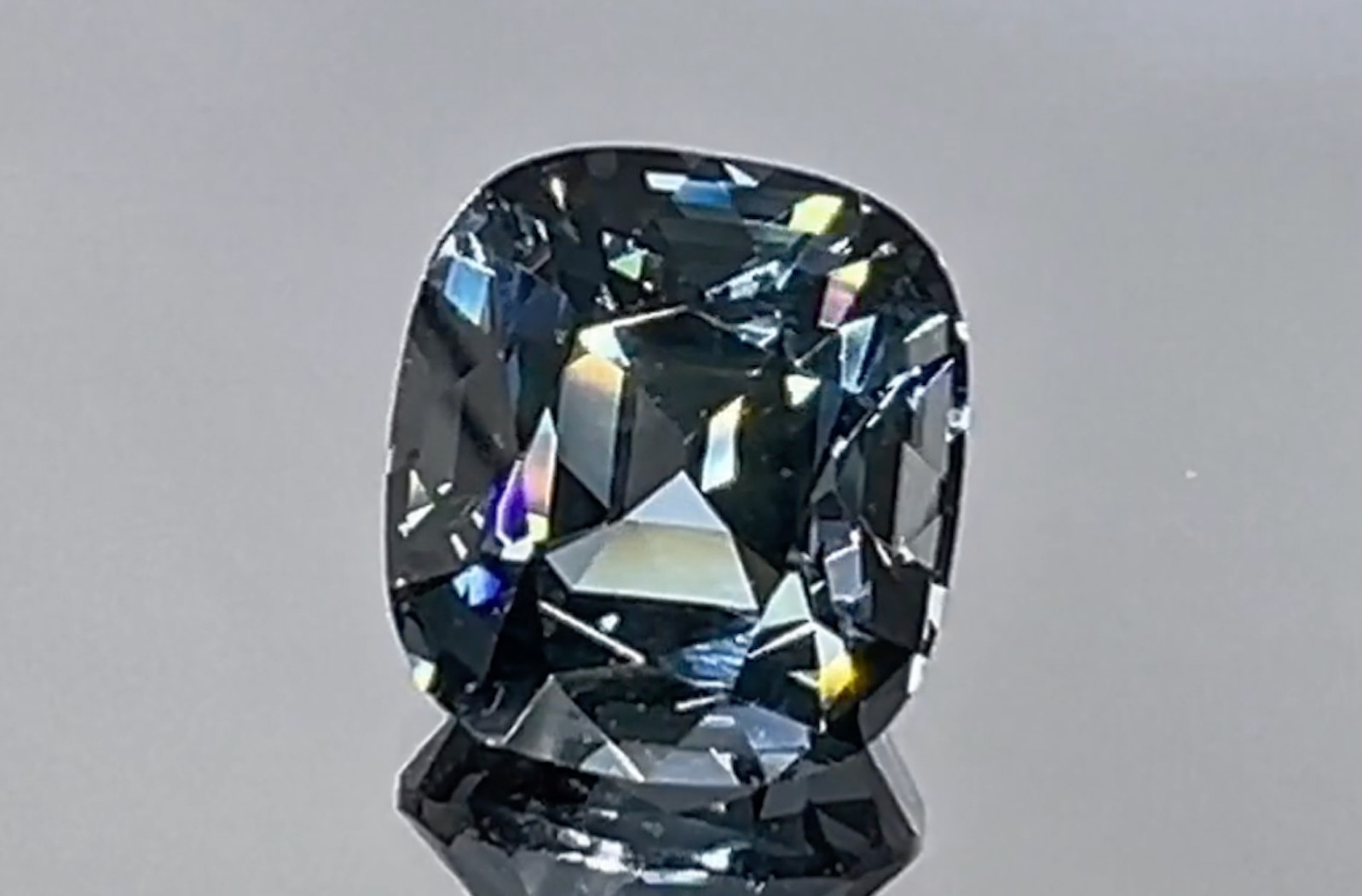 3.49ct Green Titanium Spinel Ring with D Flawless Diamonds set in 18K White Gold