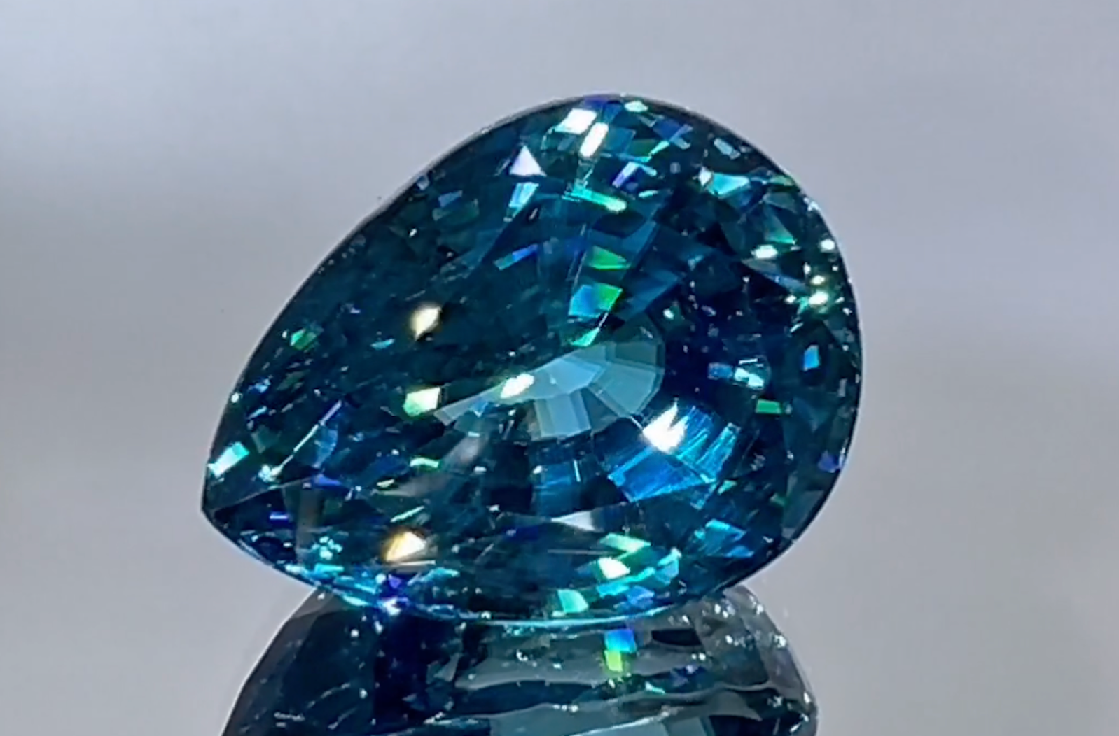 22.34ct Vivid Blue Zircon Necklace with D Flawless Diamonds set in 18K Yellow Gold