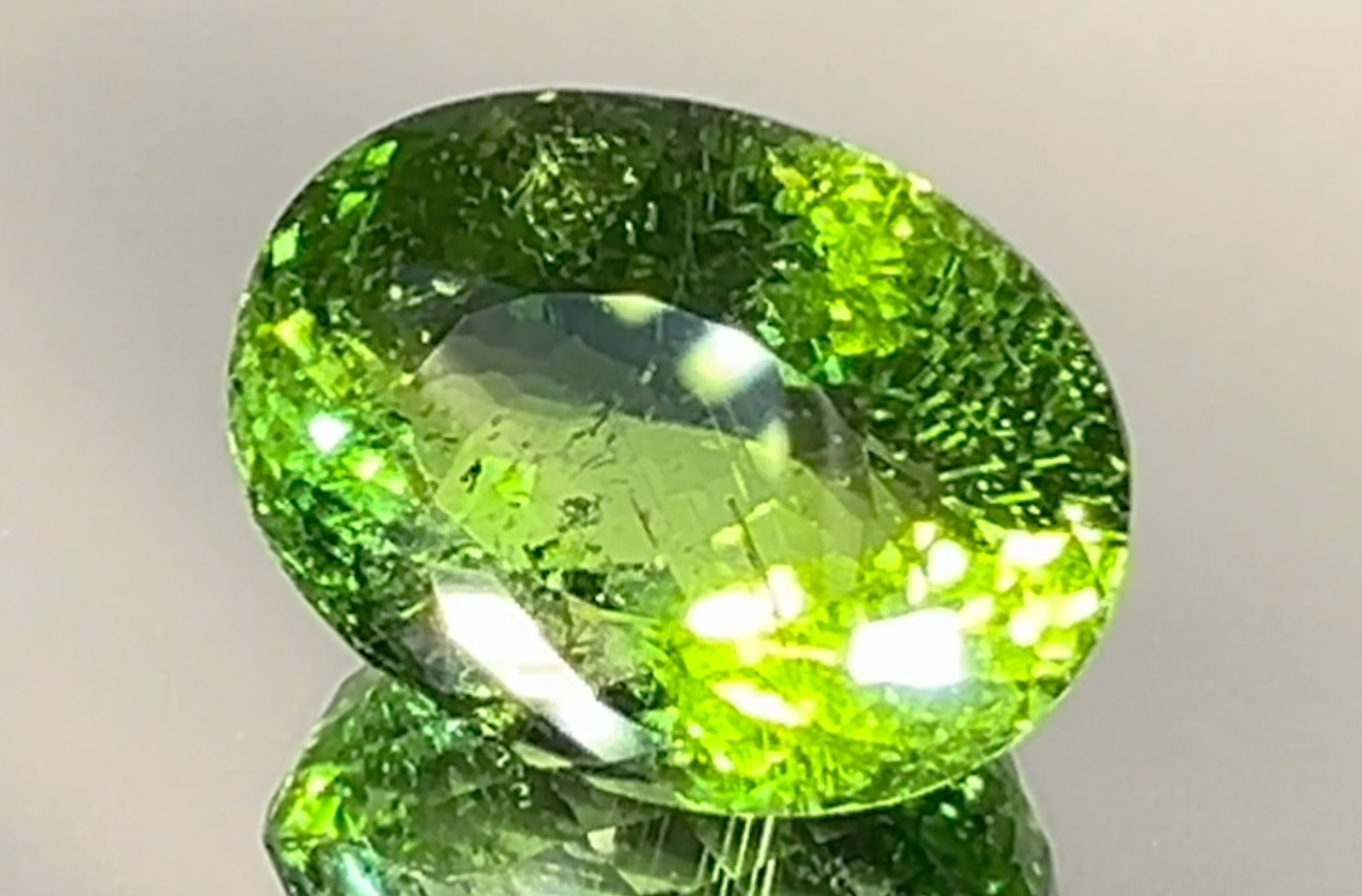 10.35ct Neon Green Paraiba Ring with D Flawless Diamonds set in 18K White Gold