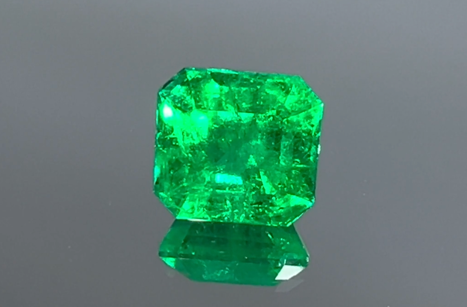 3.56ct Vivid Green Muzo Colombian Emerald Ring with D Flawless Diamonds set in 18K Yellow Gold