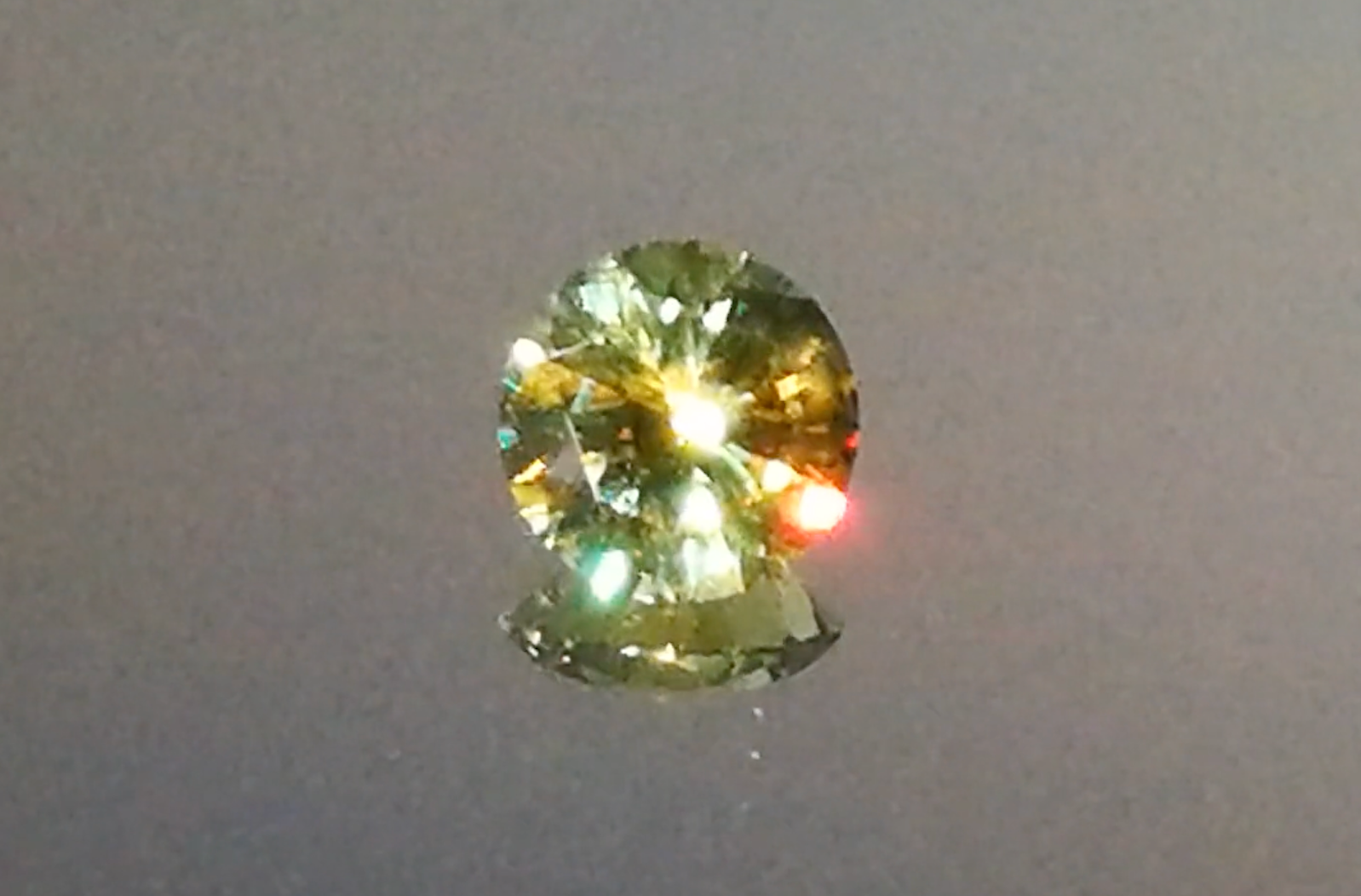 1.55ct Russian Horsetail Color Change Demantoid Ring with D Flawless Diamonds set in 18K Yellow Gold